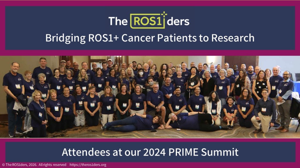 Group photo of attendees at the 2024 PRIME Summit, featuring participants wearing matching blue shirts, gathered together in a conference setting.